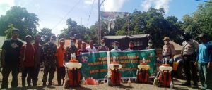 Pemdes Kala, TNI dan Polri Keliling Kampung Semprot Disinfektan