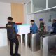 Tim Pidsus Kejati NTB saat membawa dokumen yang disita usai menggeledah kantor Bank NTB Syariah, Kamis (23/7/2026).